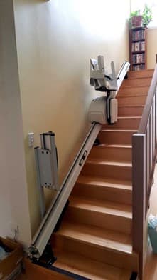 A photo of a staircase in a house that has had a stairlift fitted