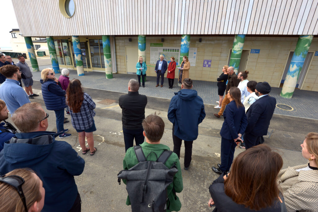 From left to right: Councillor Timpe, Councillor Oliver, Lorna Ford of RDC and Helena Dollimore, MP for Hastings and Rye speaking in front of crowd