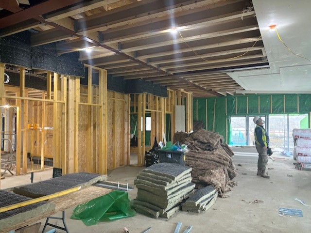 Room under construction with materials in it in Heart of Sidley building