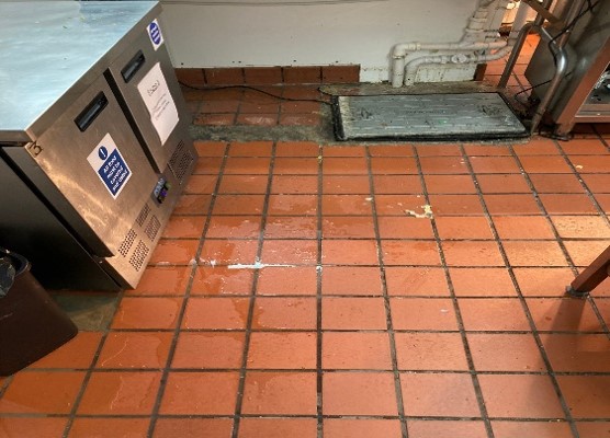 Kitchen floor and manhole cover