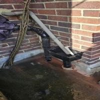 Repaired drainage downpipe