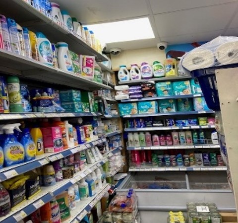Shop shelves stacked too high.