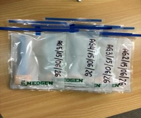 Picture shows swabs taken of food contact surfaces, labelled and packed, ready for transport to the laboratory at Porton Down.