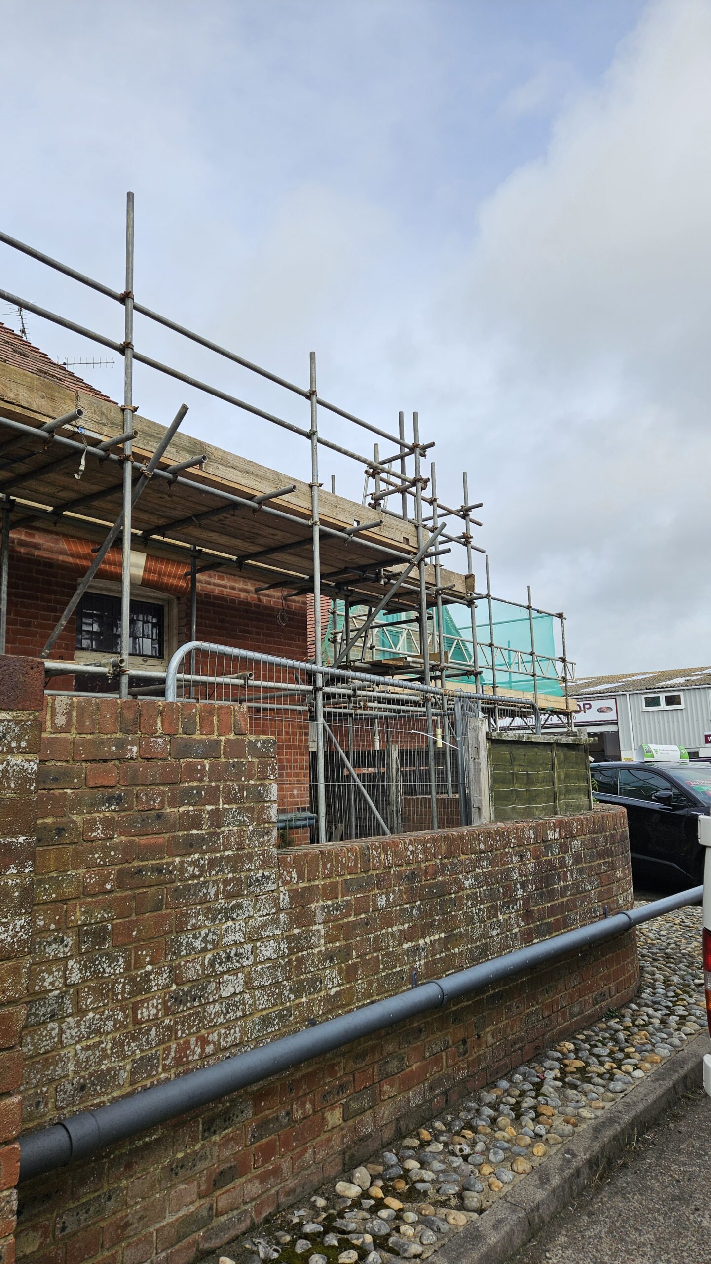 Photos of scaffolding at West Station Pub